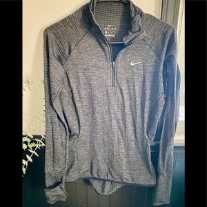 Grey Nike dri-fit.